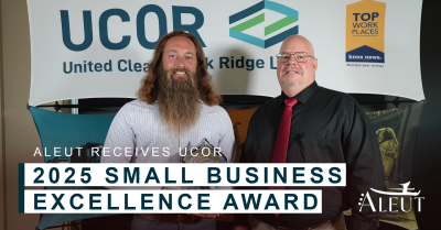 David Stevens and Steve Jackson of Aleut Demolition Services accept a 2025 Small Business Award from UCOR