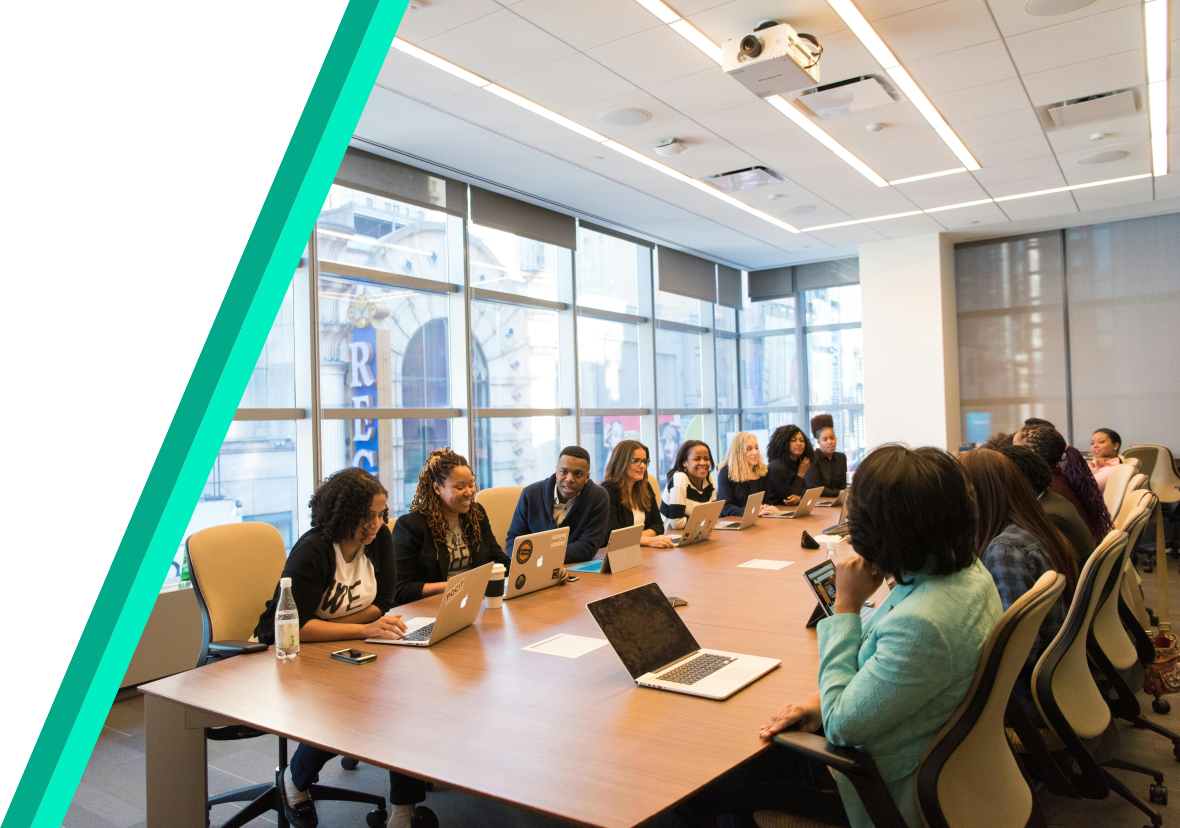 A diverse group of people having a meeting in a conference room